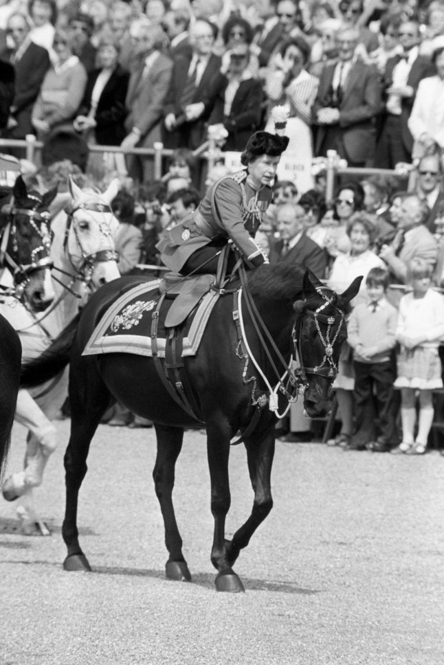 The Queen leans forward to reassure her horse Burmese as she enters Horseguards Parade after the incident in The Mall where a man fired several blanks at her from a replica pistol as she rode down The Mall to the Trooping the Colour Ceremony. The man was later named as Marcus Simon Sarjeant, of Folkestone, Kent.