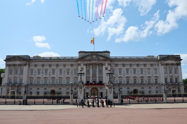 LONDON, ENGLAND - JUNE 14: The Red Arrows, officially known as the Royal Air Force Aerobatic Team, perform a flypast over Buckingham Palace after Trooping The Colour 2025 on June 14, 2025 in London, England. The Royal Air Force Aerobatic Team used a mix of approximately 40% sustainable aviation fuel (SAF) with conventional jet fuel for propulsion, and renewable Hydrotreated Vegetable Oil (HVO) for its smoke trails. This is believed to be the first time a national aerobatic team has simultaneously used two eco-friendly fuels. (Photo by Chris Jackson/Getty Images)