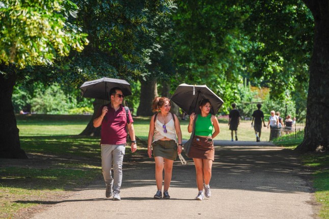 People walking in the sun.