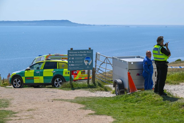 BNPS.co.uk (01202 558833) Pic: Graham Hunt/BNPS Date: 19th June 2025. UK Weather: Emergency services were called to a medical emergency on the beach at Durdle Door in Dorset and could be seen giving CPR to a patient. Police, Ambulance and Coastguard were in attendance along with the Coast Guard helicopter and the Air Ambulance to give assistance to the casualty on the beach beneath the cliffs of Swyre Head on an afternoon of scorching hot sunshine.