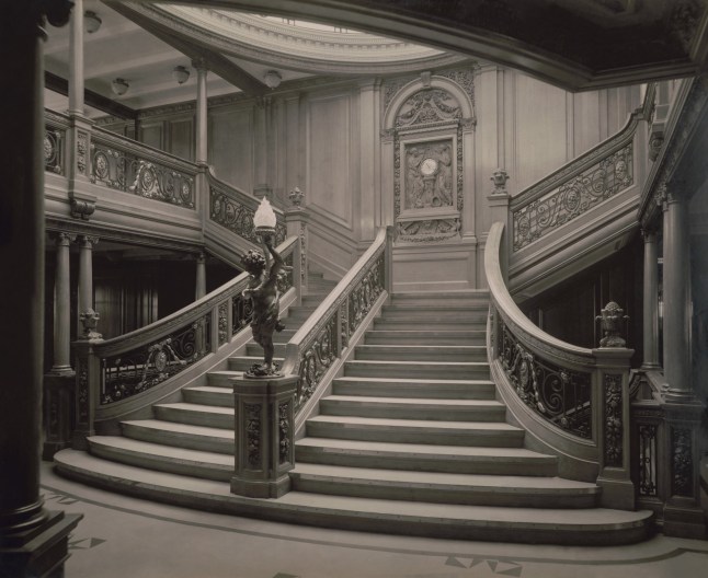 Mandatory Credit: Photo by Everett/REX/Shutterstock (10112079a) White Star Line S.S. Olympics Grand Stairway, 1911. Olympics sister ship, the S.S. Titanic, was then under construction in Belfast, Ireland